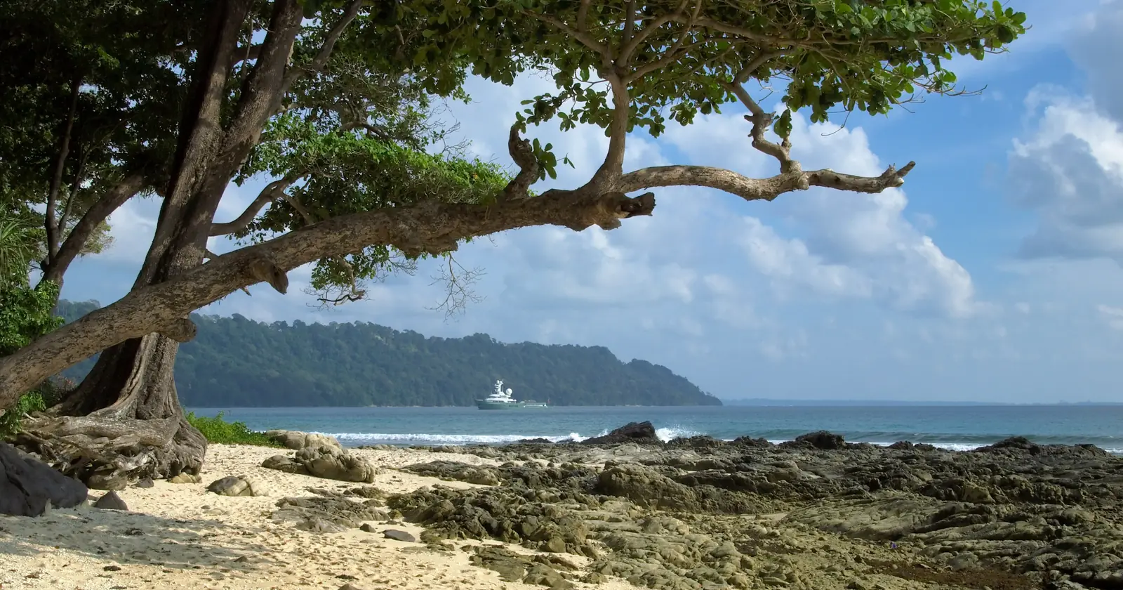Rocky shore and the bay off Radhanagar Beach on Havelock Island, where the 2010 Andaman saltwater crocodile attack on a snorkeler took place