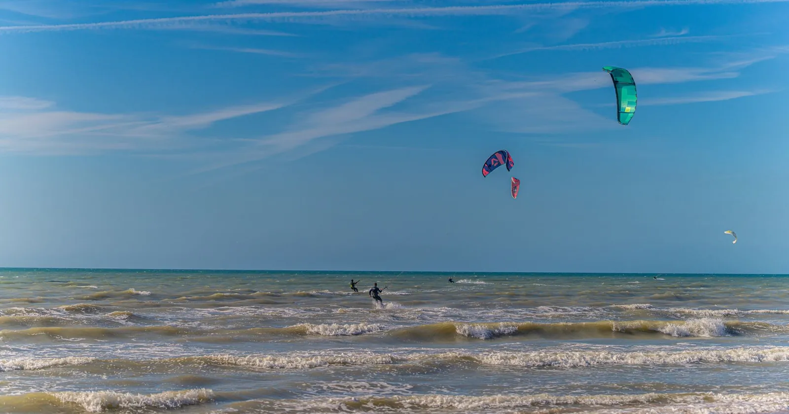 Board on the water, a wind-sports scene