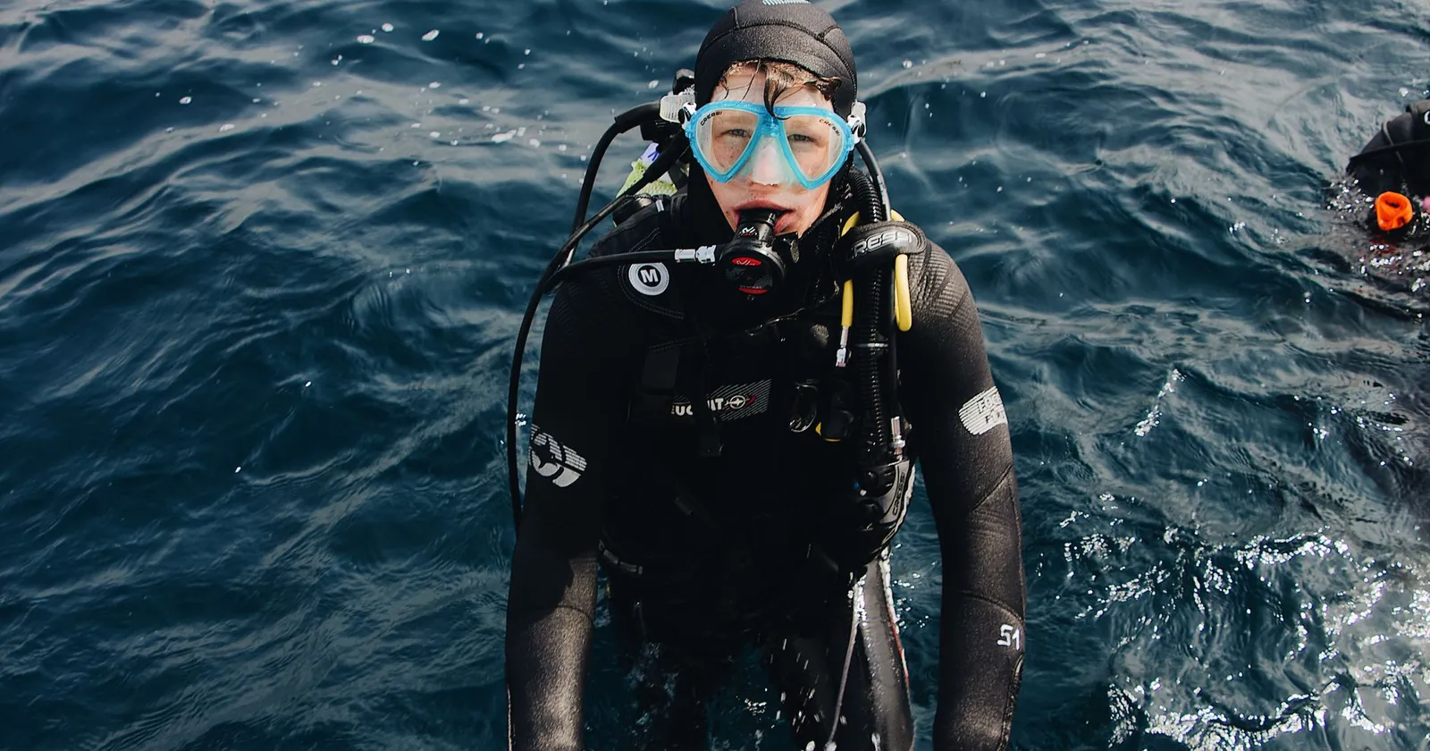 Colourful reef seen clearly through a diver's mask