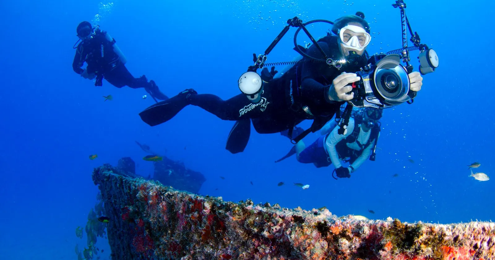 Scuba diver descending, wrist dive computer for travel