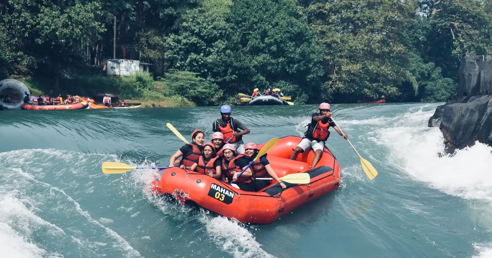 Group enjoying a thrilling whitewater rafting experience in