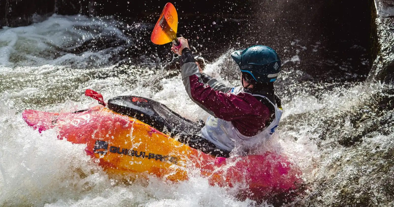Experience the exhilaration of kayaking through Ireland's ra