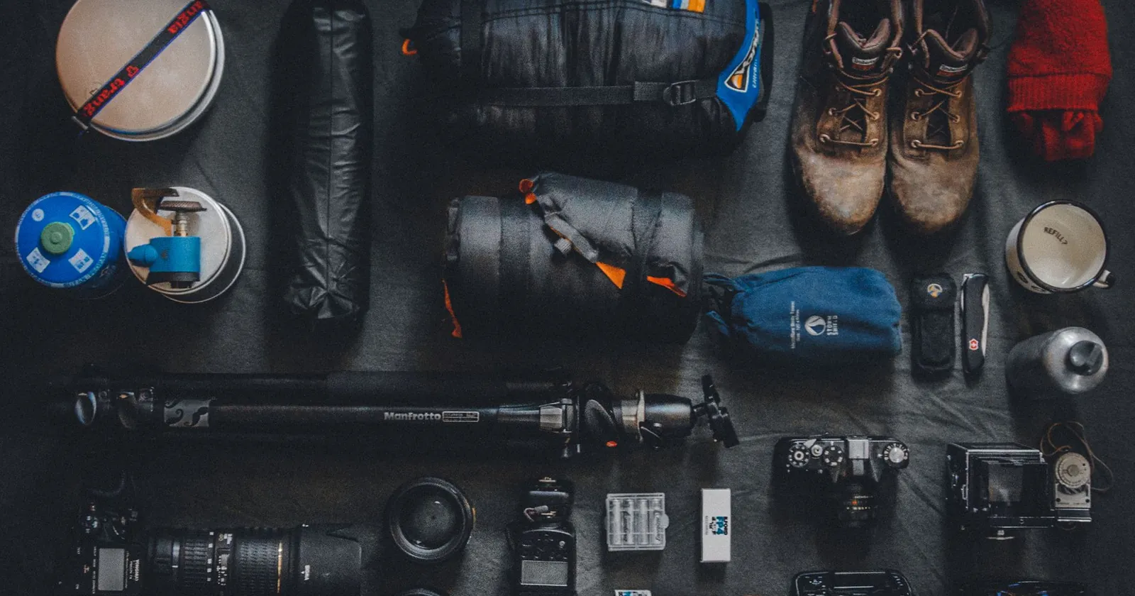 Diver with mask, fins and camera, the watersports nomad's personal kit