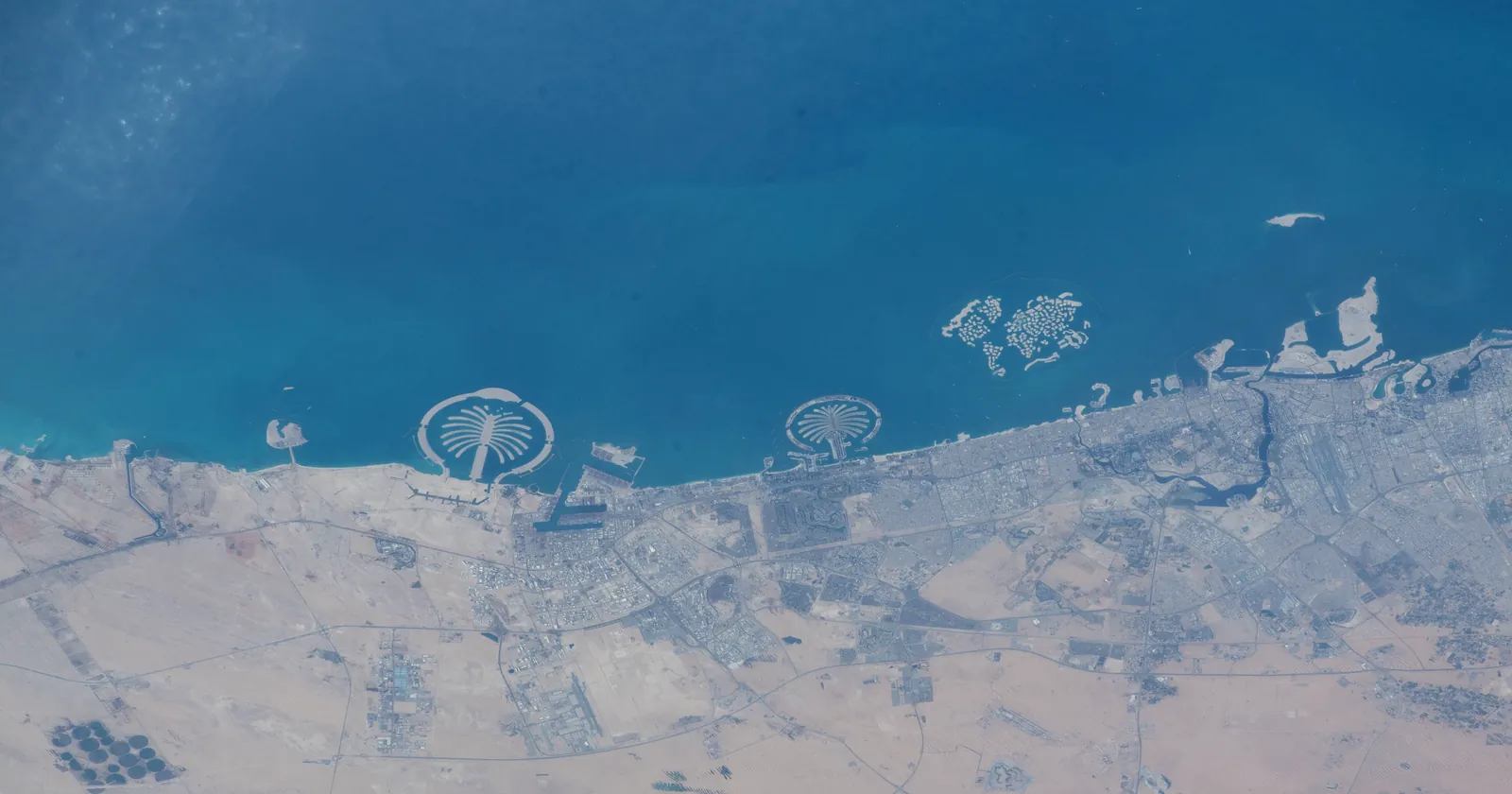 Dubai coast photographed from the International Space Station, with Palm Jebel Ali, Palm Jumeirah and the World Islands on the water where Dubai diving now happens