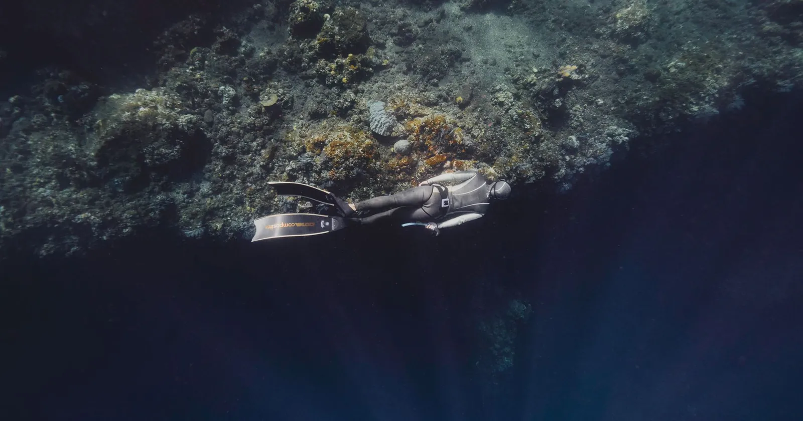 Scuba diver in full kit underwater, one of two ways to explore the ocean