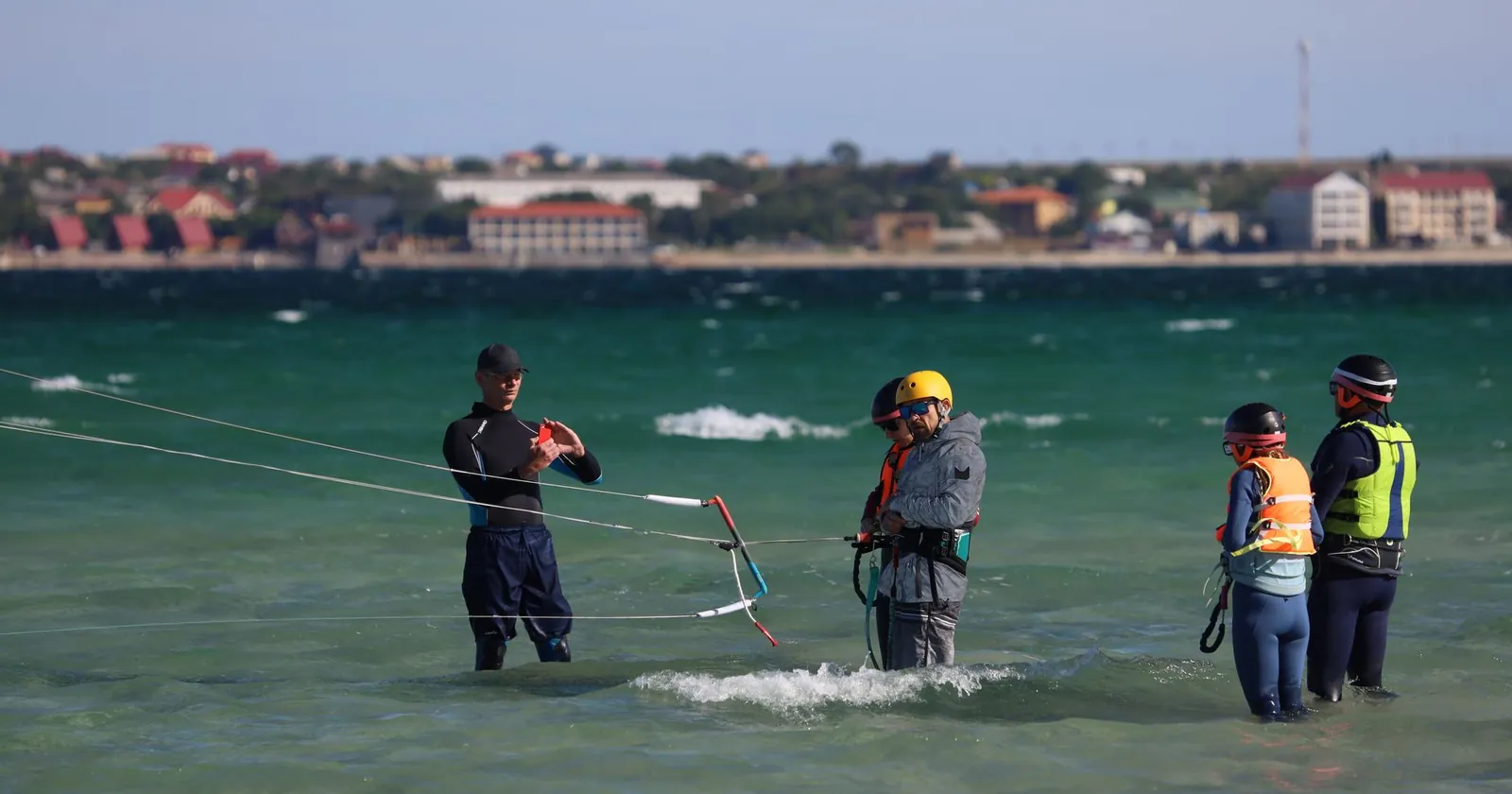 Board rider on the water, wind-powered watersport