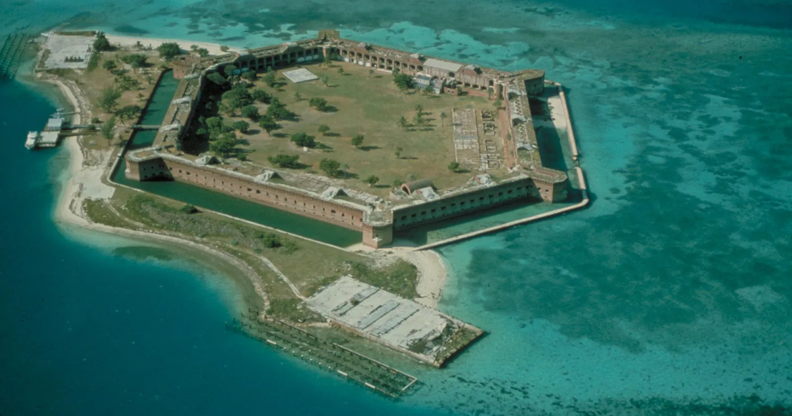 Fort Jefferson on Garden Key in Dry Tortugas National Park from the air, ringed by shallow reef flats, the snorkel day trip from Key West