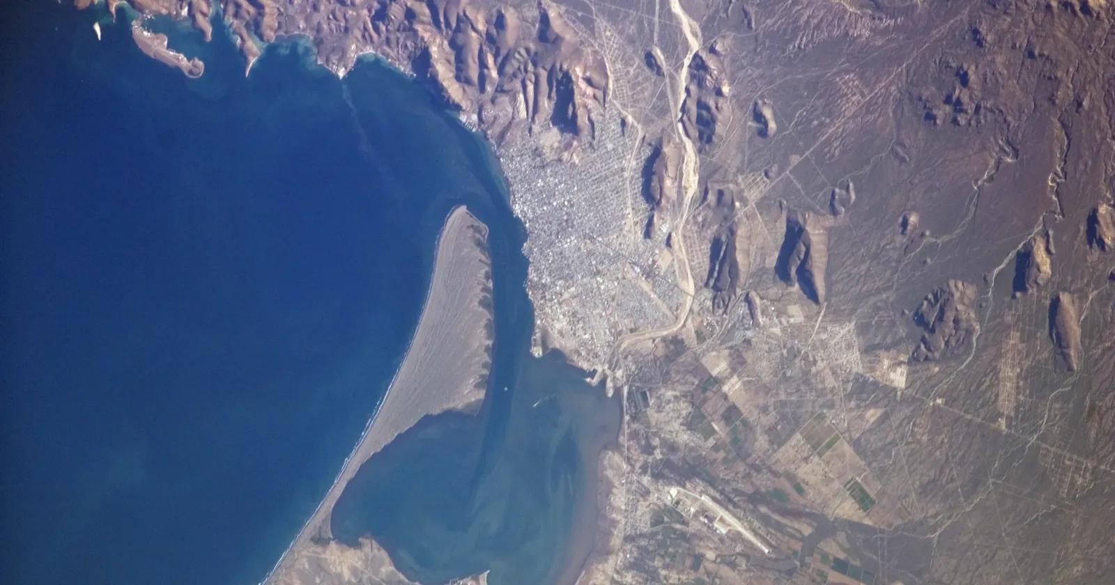 The El Mogote sandbar and the ensenada of La Paz seen from the International Space Station, the southern edge of the whale shark refuge in La Paz diving and snorkeling