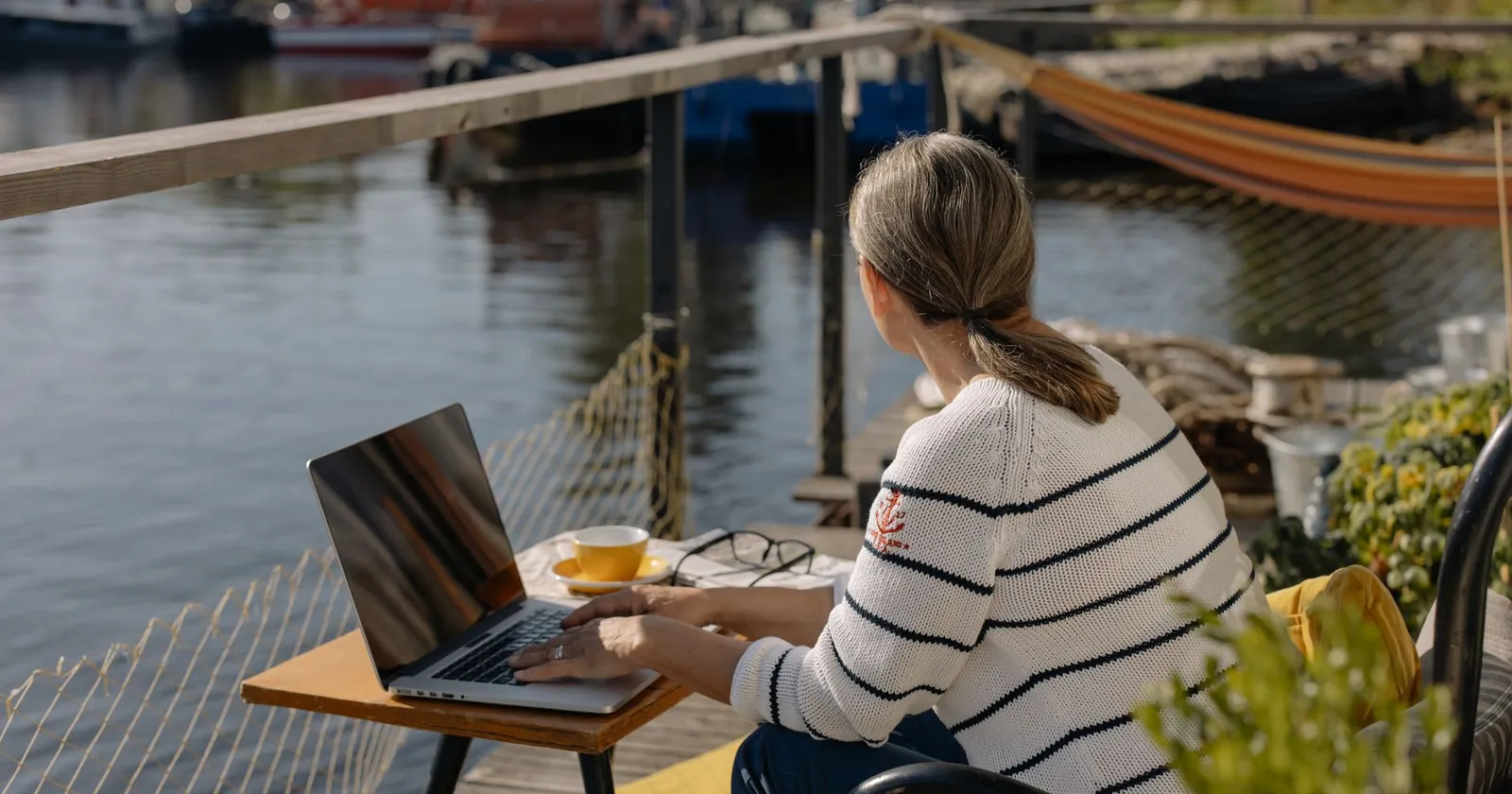 Laptop on a boat with Starlink and calm anchorage