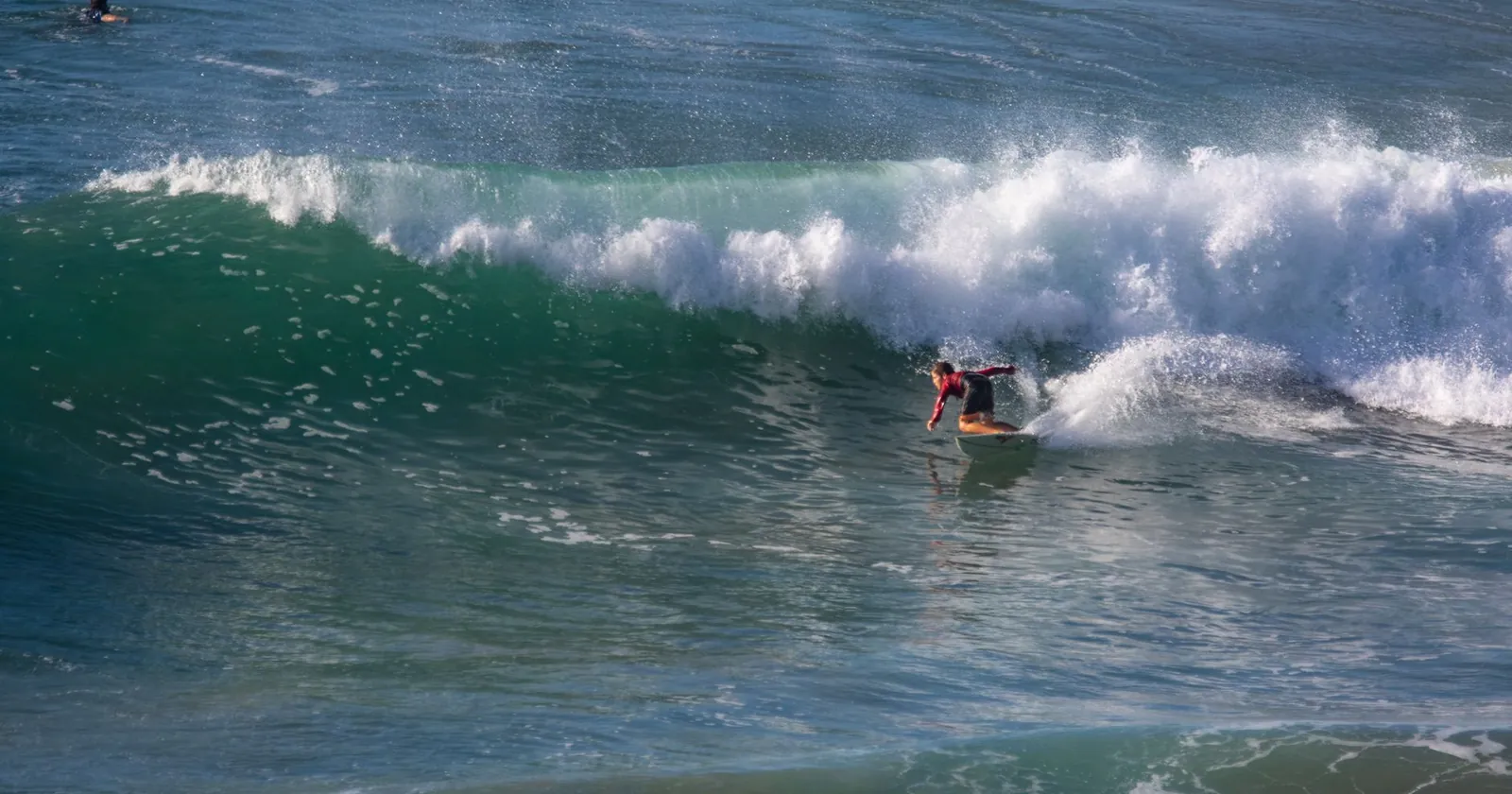 Palm-fringed island surf break, the kind of setting at Siargao