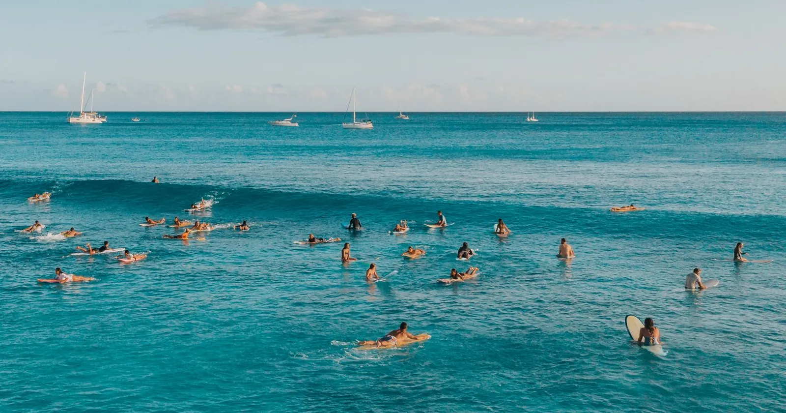 Surfer's feet on a board riding whitewater